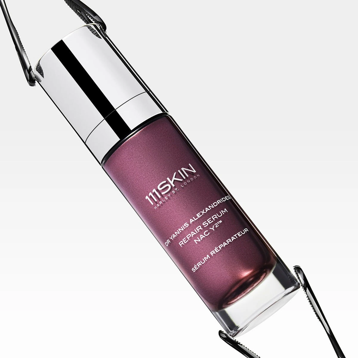 111SKIN Repair Serum NAC Y2 shown in a premium glass bottle with metallic cap, highlighting luxury skincare innovation and high-end beauty formulation.
