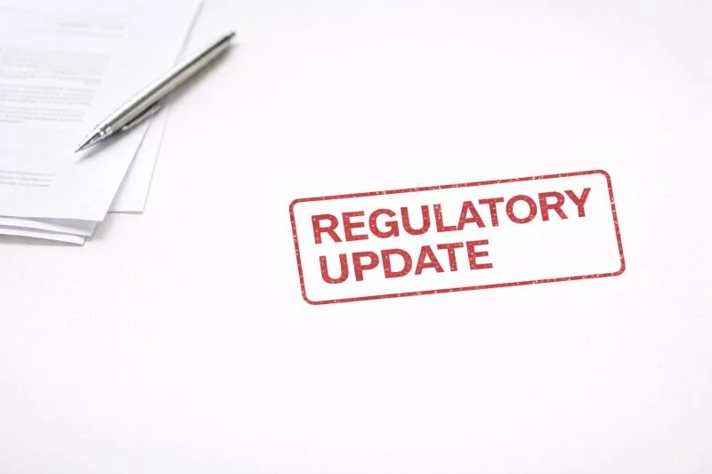 A red stamp on a white document reads REGULATORY UPDATE, signifying that Glyoxylic Acid Banned in Israel.